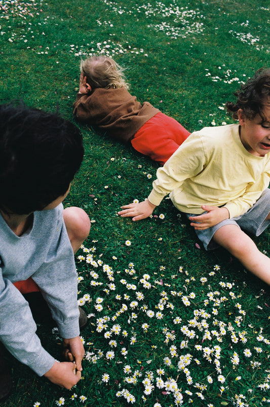 The Beauty of Buying Less: Why Timeless, Organic Pieces Make Childhoods (and the Planet) Better